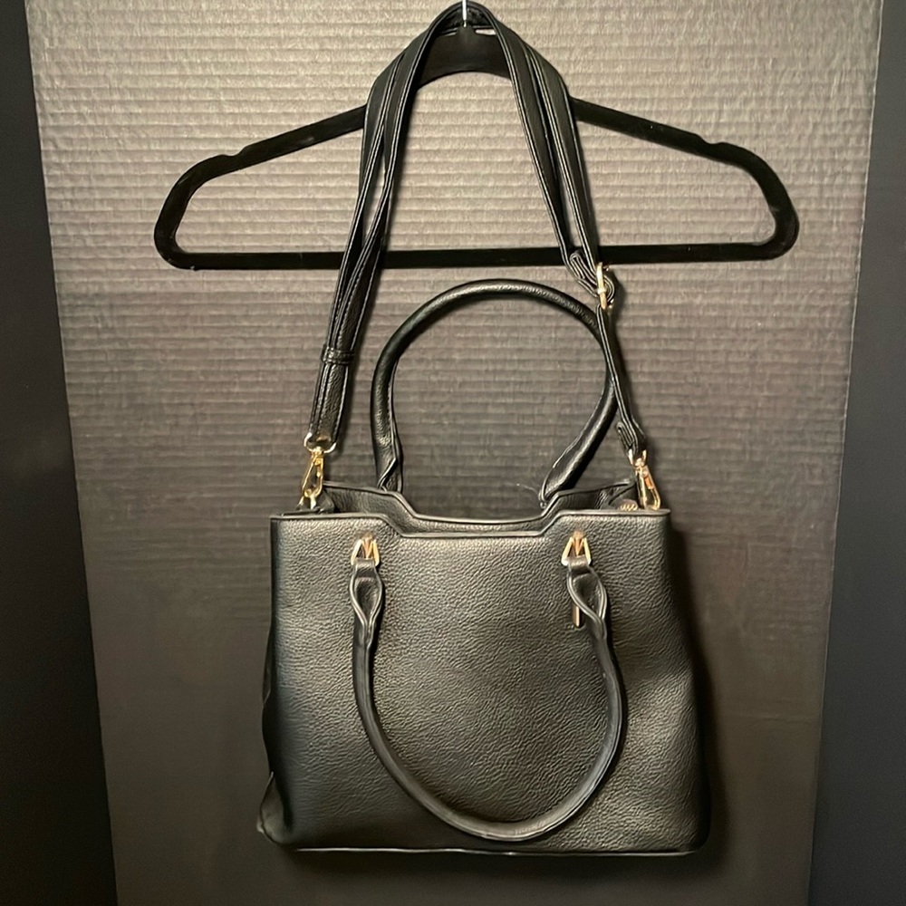 Women’s black shoulder bag